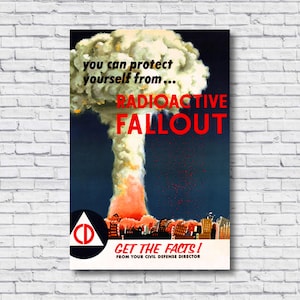 May include: A vintage poster with a red and white design. The poster features a mushroom cloud with the text "You can protect yourself from... Radioactive Fallout." and "Get the Facts! From your Civil Defense Director."