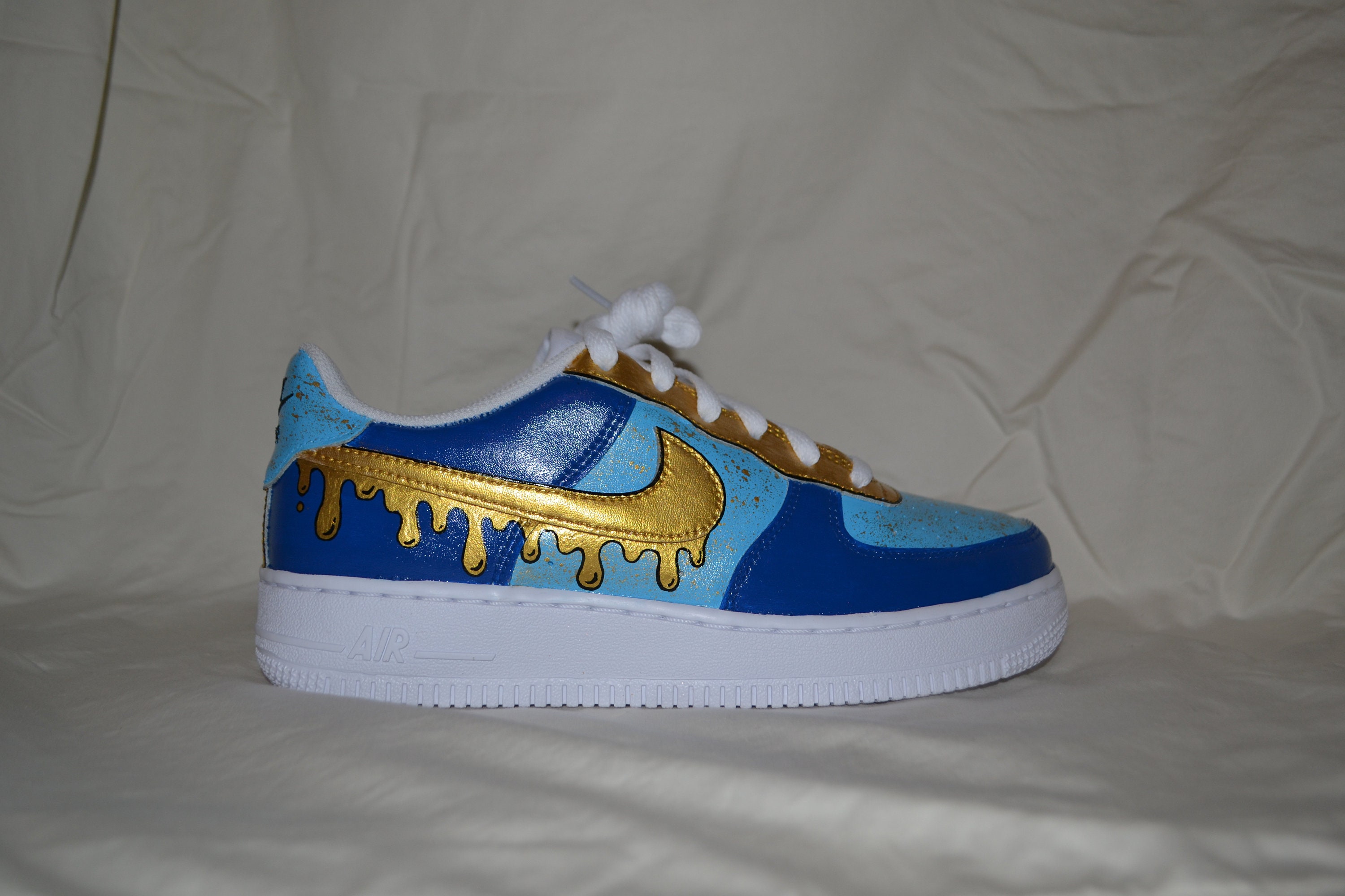 Gold and blue sneakers sale