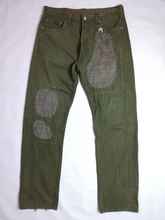 olive green levi 501 jeans