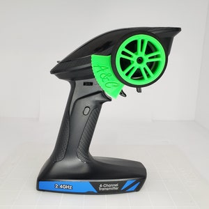 La commande au pouce s'adapte UNIQUEMENT au contrôleur SCX24 V2 (bleu)