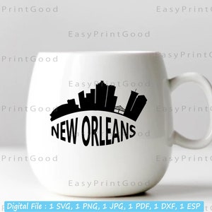 May include: White ceramic mug with a black silhouette of the New Orleans skyline and the text "NEW ORLEANS" printed on the front.