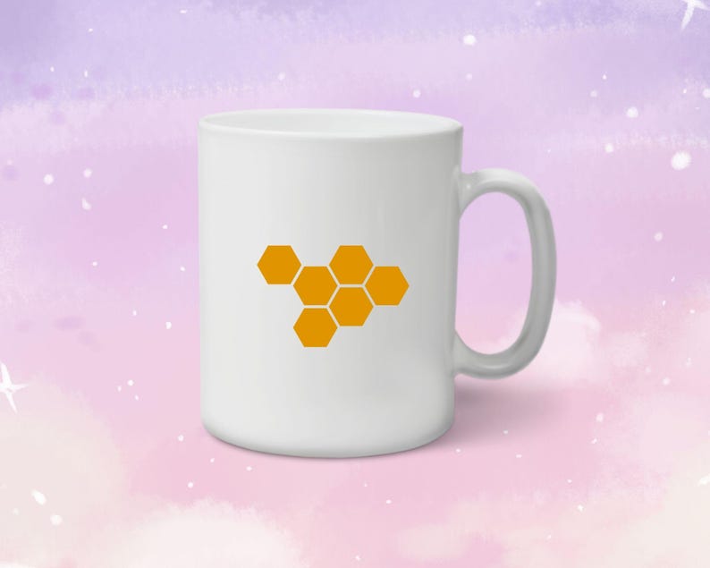 May include: White ceramic mug with a honeycomb design in orange. The mug has a handle on the right side.