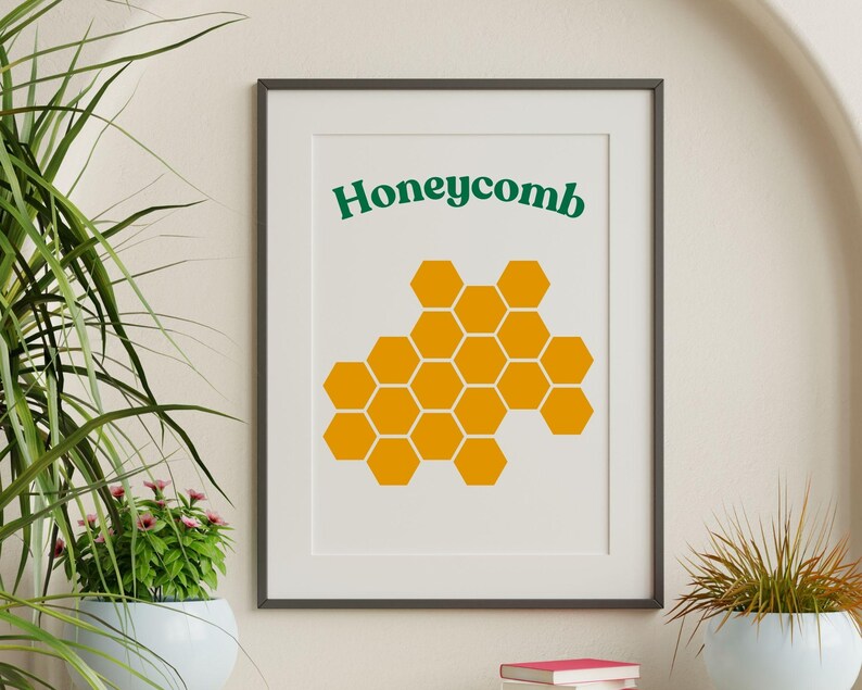 May include: A framed print with a yellow honeycomb design and the word "Honeycomb" in green text.