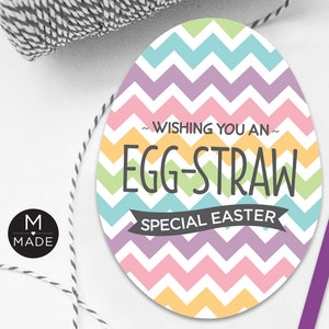 May include: A pastel pink, yellow, blue, green, and purple chevron patterned Easter egg with the text "Wishing you an Egg-Straw Special Easter".