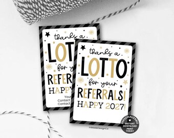 May include: Two rectangular cards with black and white diagonal striped borders. The text reads: thanks a LOTTO for your REFERRALS! HAPPY 2027! The design features gold and black lettering, small gold stars, and starburst icons on a white background.