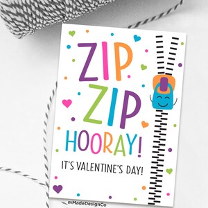 May include: A colourful Valentine's Day card with the words "Zip Zip Hooray! It's Valentine's Day!" and a cartoon zipper with a smiling face.
