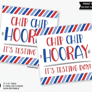 May include: Six printable 3x3 inch tags with a red, white, and blue striped border. The text on the tags reads "Chip Chip Hooray! It's Testing Day!"