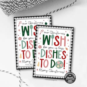 May include: Two rectangular Christmas cards with a black and white checkered border. The cards read "Our Christmas Wish for you is less Dishes to do! Merry Christmas!" in green, red, and white. A spoon and ornament are also featured.