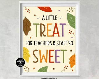 May include: A framed print with a cream background and colorful text that reads "A LITTLE TREAT FOR TEACHERS & STAFF SO SWEET." The design includes fall-themed illustrations like leaves and acorns.