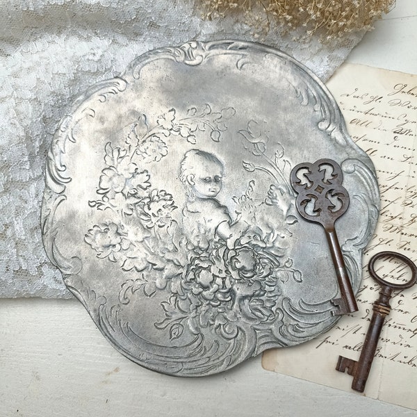 Old pewter plate with children's motif, pastry plate made of pewter, old patina, antique decorative plate