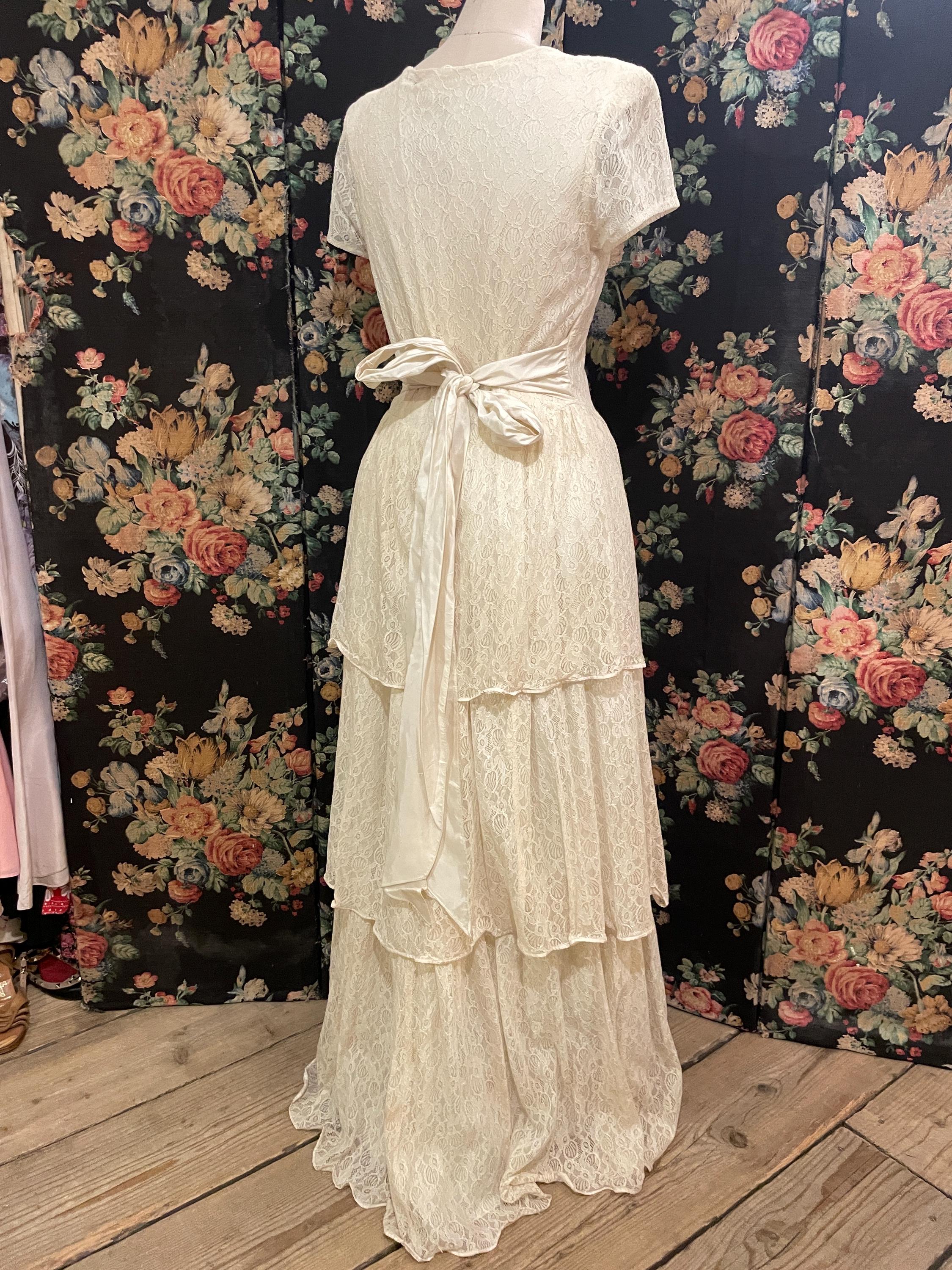 vintage wedding dress cream lace bridal gown with tiered skirt big bow and matching detachable sleeves gloves