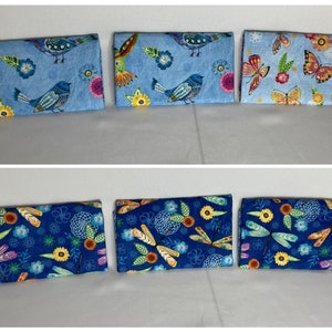 Mariposas, pájaros, carteras temáticas de flores