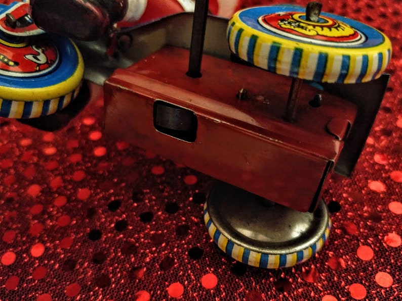 Vintage Tin Wind Up Santa Claus Riding Tricycle