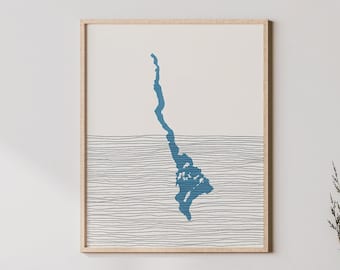 May include: A minimalist living room interior with a light wood console table, a white chair, and a framed print of a blue abstract design. The print features a vertical line with a horizontal line across the middle, and a blue shape resembling a peninsula.