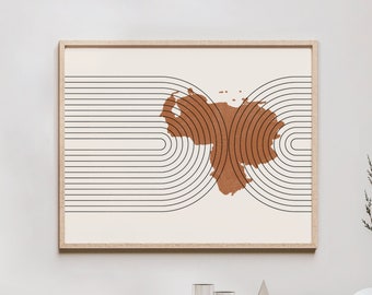 May include: A framed abstract art print featuring a beige background with a brown shape and black curved lines. The artwork is displayed above a wooden cabinet with decorative items.