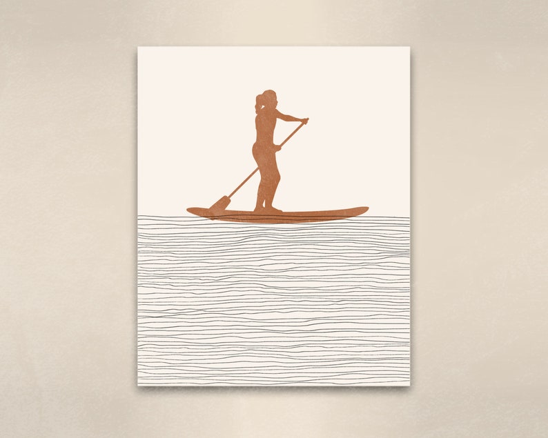 May include: A brown silhouette of a person standing on a paddleboard with a paddle in hand, against a white background with black lines representing water.