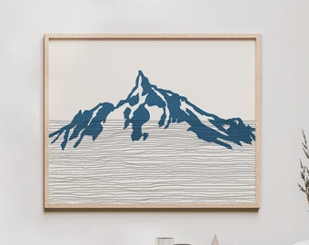 May include: A minimalist art print featuring a blue silhouette of a mountain range with thin black lines representing the horizon. The print is framed in a light wood frame.