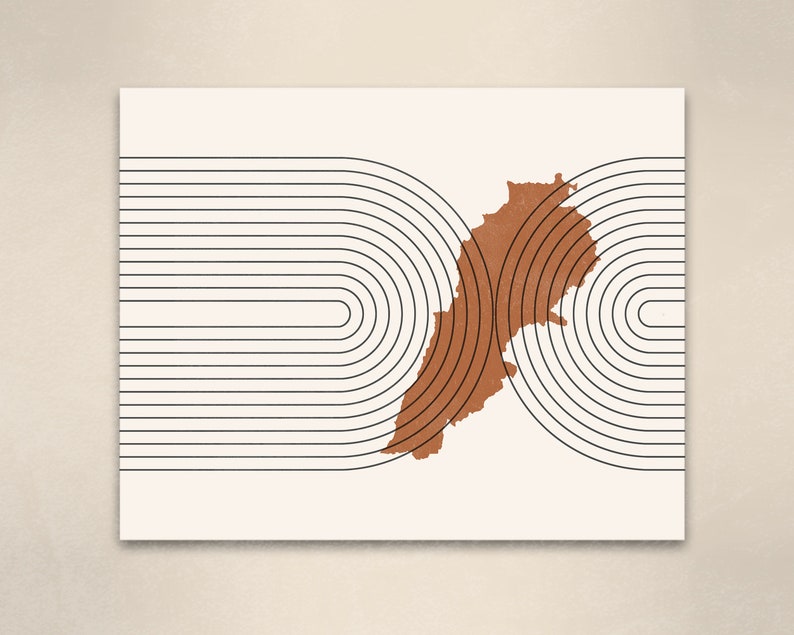 May include: An abstract geometric print featuring a brown outline of Lebanon against a white background with black concentric circles.