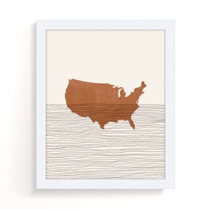 May include: A minimalist art print featuring a brown outline of the United States map against a background of thin black lines on a cream background.