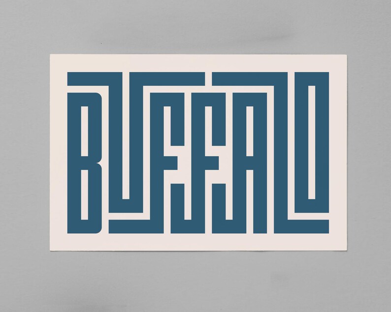 May include: A white card with the word "BUFFALO" written in a blue, geometric font.