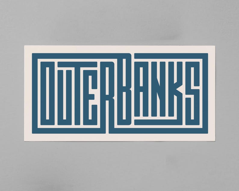 May include: A white sticker with a blue graphic of the word "OUTER BANKS" in a stylized font.