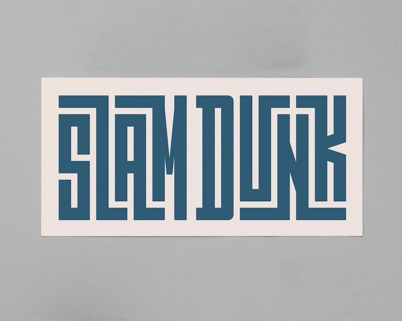 May include: A white rectangular sticker with the text "SLAM DUNK" in a blue geometric font.