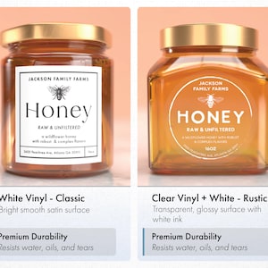 two jars of honey, one labeled "Honey Raw & Unfiltered" and the other labeled "Honey Raw & Filtered".
