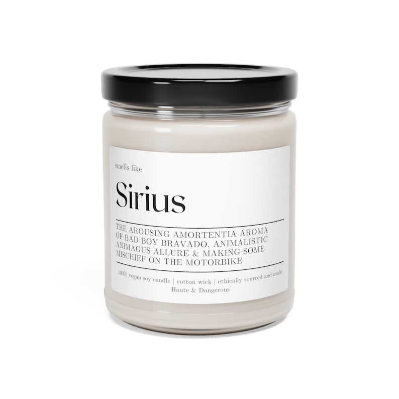 magical soy based wax candle lit on a table that reads "smells like sirius black"