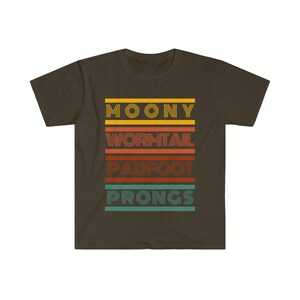 May include: A brown t-shirt with a retro-style graphic design featuring the names "Moony", "Wormtail", "Padfoot", and "Prongs" in colorful, layered text.