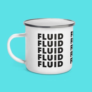 May include: White enamel mug with a black and white design. The mug has the word "FLUID" repeated five times in a vertical stack.
