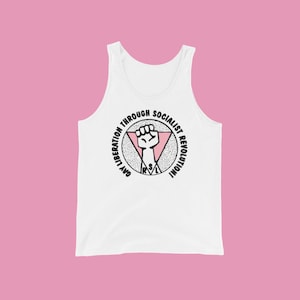 May include: White tank top with a black and pink graphic of a raised fist in a circle with the text "Gay Liberation Through Socialist Revolution".