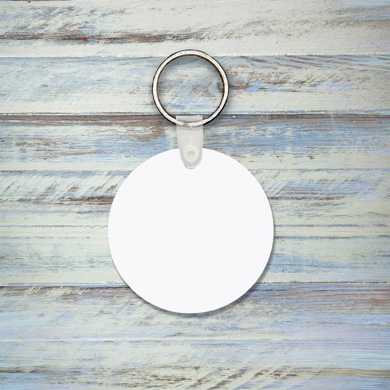Download Dye sublimation round shaped MDF keychain mockup for ...