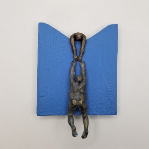 Wall figurine helping a climber, wavy base, original sculpture, by Diaz art, mixed media, wall mounted art limited edition, modern art Blue