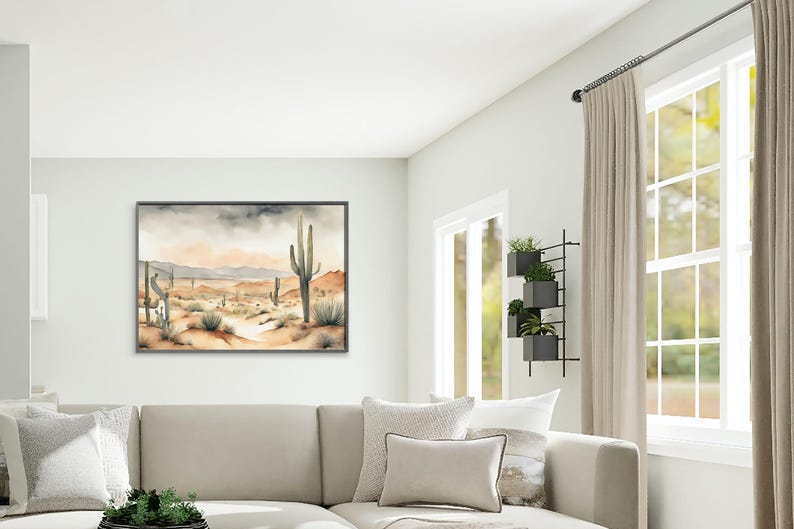 Sunlight pours through glass windows into a relaxed, energetic family room, where an artistic beautiful watercolor desert landscape painting steals the spotlight