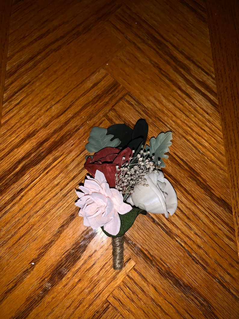 Sola wood flower boutineer custom made to order.