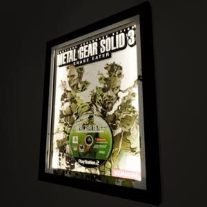 Metal Gear Solid 3: Snake Eater Replica CD Deluxe Shadow Box Framed Art (Select a Size) (Choose a Background) (Optional Lighting)