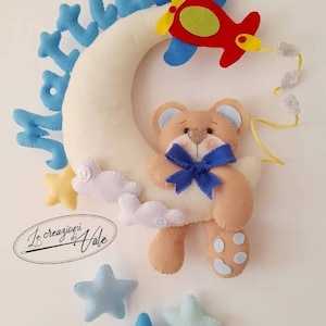 Fuoriporta nascita personalizzata con un dolce orsetto aggrappato alla luna...