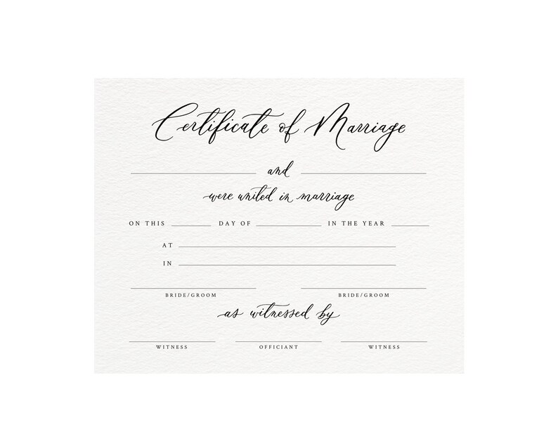 May include: A blank certificate of marriage with lines for the bride and groom's names, the date, and the officiant's name. The text "Certificate of Marriage" is written in cursive at the top of the document.
