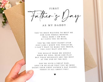 May include: A white card with black text that reads "First Father's Day as my Daddy". The card has a sweet message for a new dad.