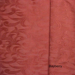 May include: Close-up of a red fabric with a swirling pattern. The fabric has a subtle sheen and a textured surface. The word "Bayberry" is printed in white at the bottom right corner of the image.
