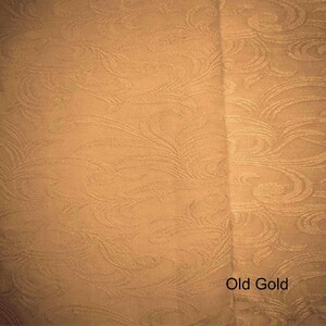 May include: A close-up of a fabric with a swirling pattern in a muted gold color. The text "Old Gold" is visible at the bottom of the image.