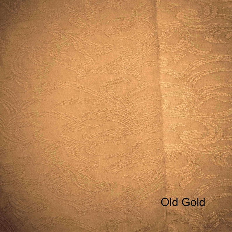 May include: A close-up of a fabric with a swirling pattern in a muted gold color. The text "Old Gold" is visible at the bottom of the image.