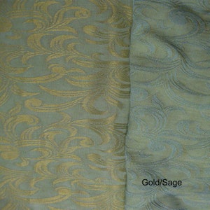 May include: Close-up of a fabric with a sage green background and a gold swirl pattern. The text "Gold/Sage" is visible in the bottom right corner of the image.