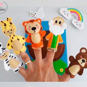 Pode incluir: Um conjunto de fantoches de dedo de feltro com uma girafa, uma zebra, um tigre, um urso, um homem com barba, uma pomba, um arco-&iacute;ris e duas nuvens. Os fantoches s&atilde;o projetados para contar hist&oacute;rias e brincar de forma imaginativa.