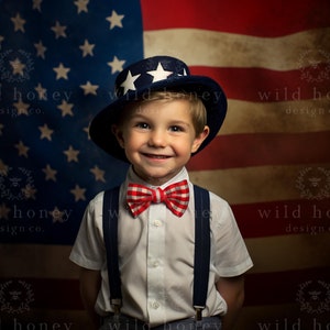 May include: A child wearing a navy hat with white stars, a red and white checked bow tie, and braces, smiling in front of an American flag. The background is a vintage-style American flag.
