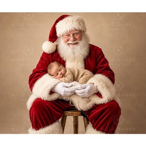 May include: Santa Claus wearing a traditional red velvet suit with white faux fur trim and a matching hat, featuring a long white beard, wire-rimmed glasses, and white gloves, holding a sleeping newborn baby dressed in a tan knitted onesie.