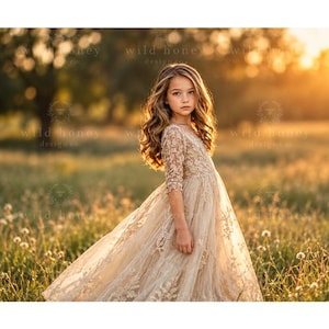 May include: A beige lace dress with three-quarter length sleeves and a full, flowing skirt. The bodice and skirt feature intricate floral embroidery patterns. The dress has a fitted waistline and a rounded neckline, crafted from delicate fabric.
