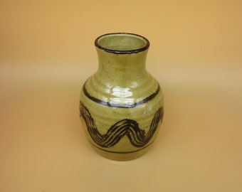 Pinched neck vase hand thrown by Woodleigh Canada in brown glazes.