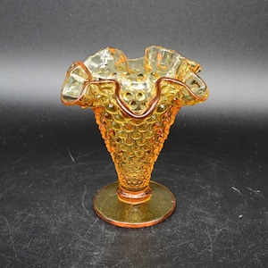 Small Fenton amber ruffled edged hobnail  footed glass vase