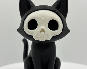 Figurina stampata in 3D con gatto nero con faccia da fantasma